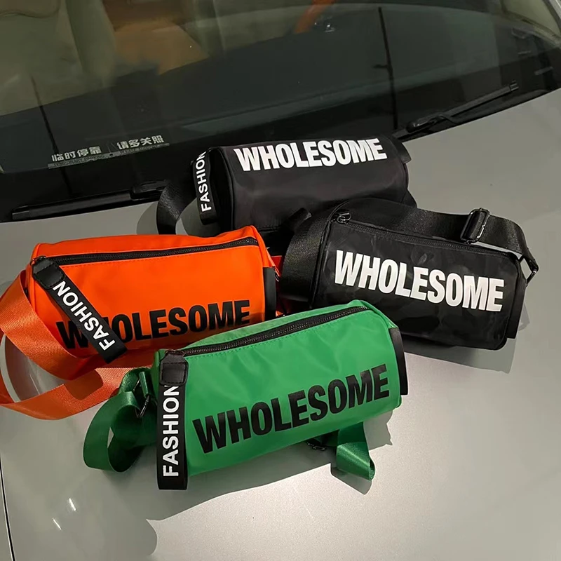 2023新款包包女宝蓝质感牛津布包小众圆筒包运动休闲枕头包斜挎包