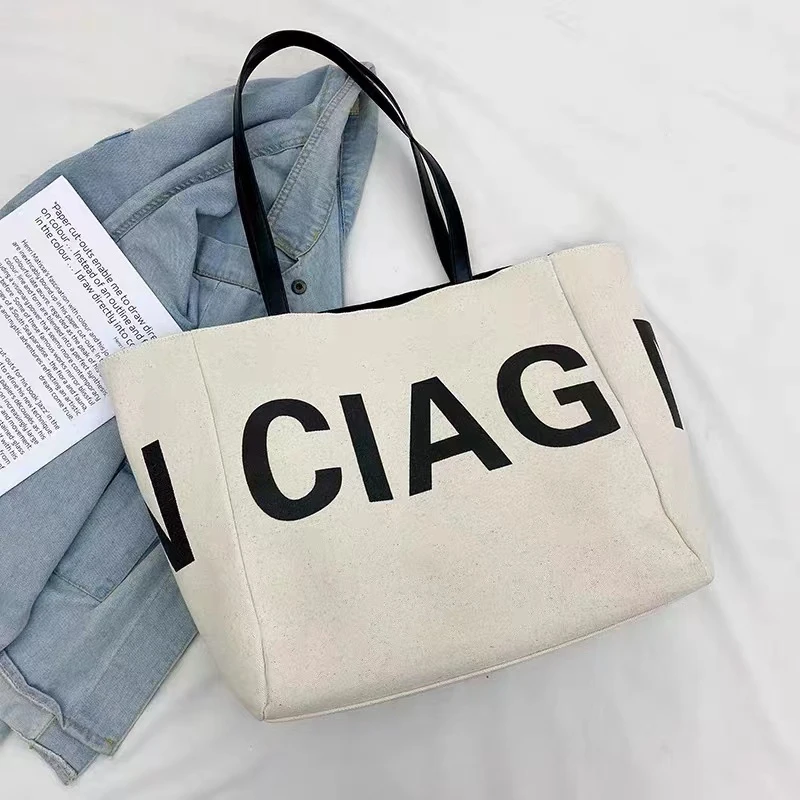 夏夏家推荐大号帆布字母减龄经典质感跃时尚百搭款手提包