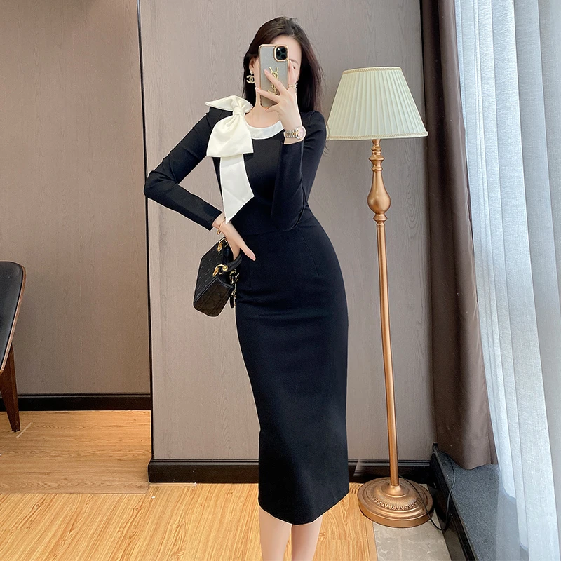 秋季轻奢撞色黑色长袖连衣裙女高级感蝴蝶结气质修身显瘦包臀裙子