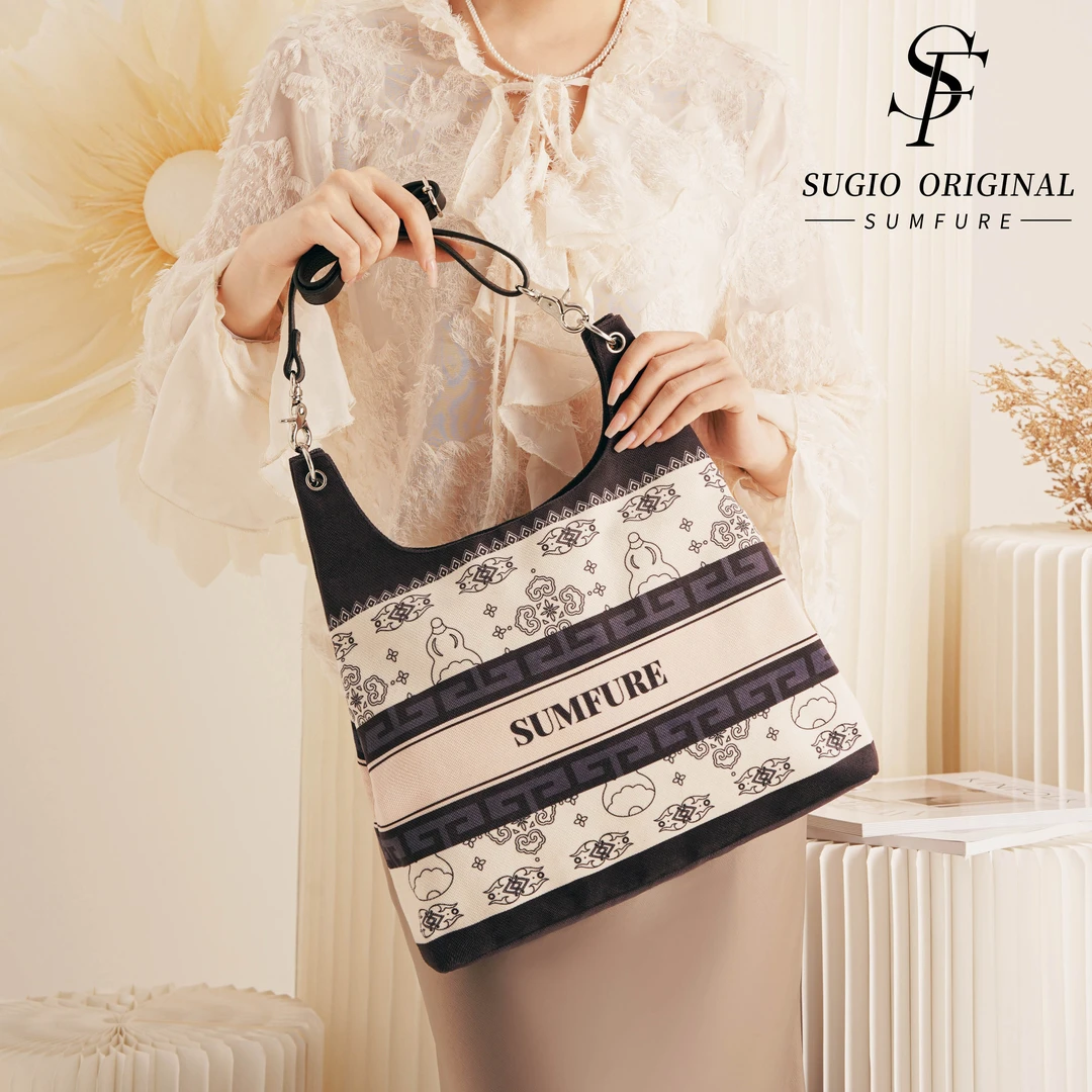 杉夫原创中国风牛角包轻奢时尚印花通勤大容量女单肩斜挎