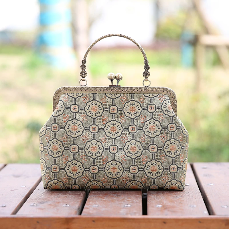 妙布语手工旗袍包女包手提包中国风复古口金包三花口金黄色织锦