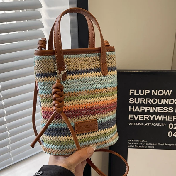 夏季新款草编小包包女2024彩虹编织手提包时尚洋气沙滩斜挎包