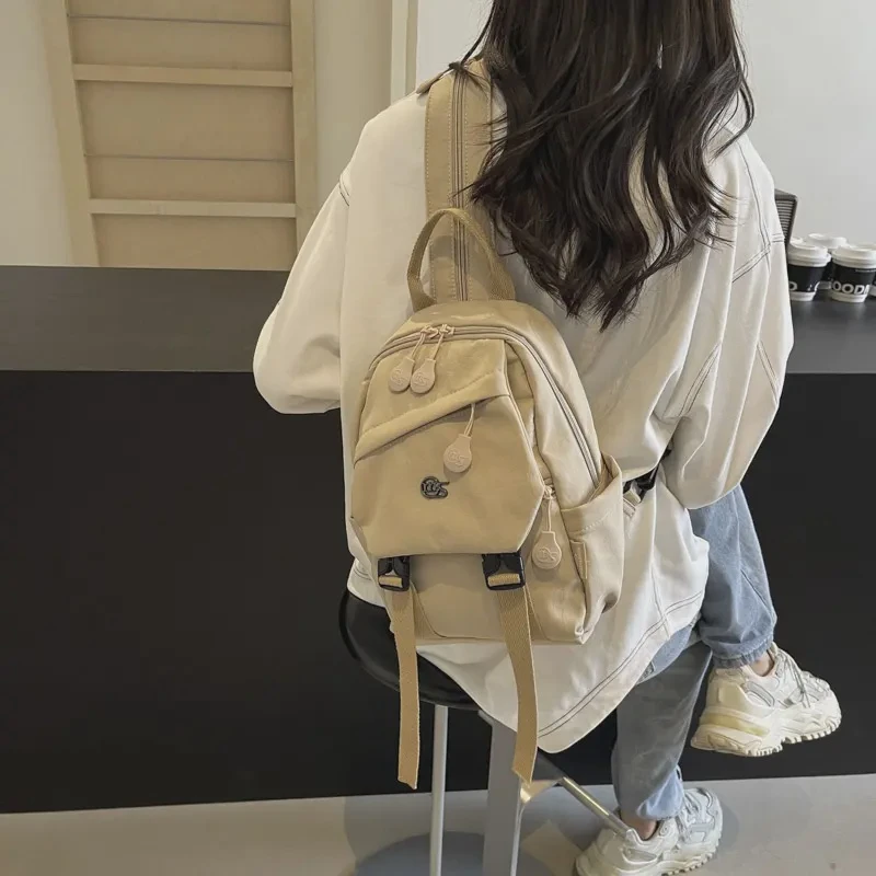 新款多功能斜挎双肩休闲百搭纯色时尚潮流文艺女士布包轻便旅行包