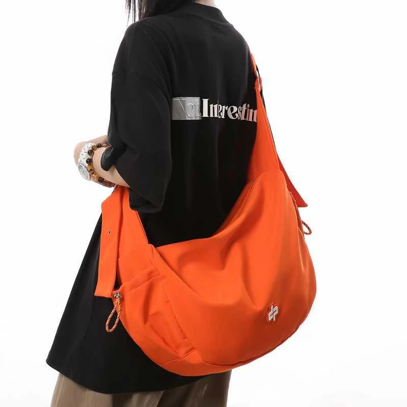 花少同款原创潮牌运动斜挎包男女旅行包单肩饺子包大学生背包通勤