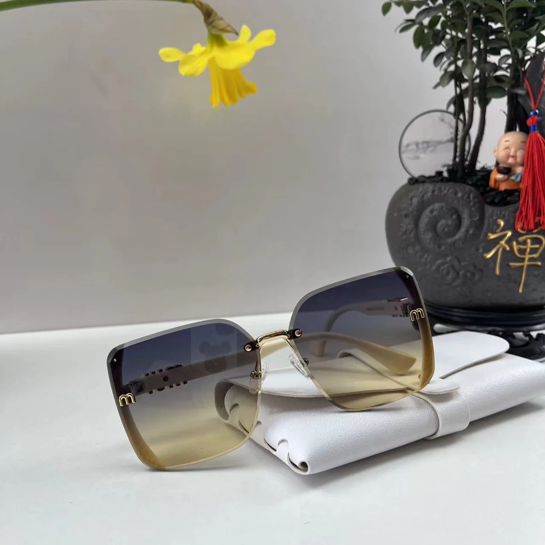 1002女士时尚 防紫外线 网红 气质 复古遮阳潮流渐变无边框太阳镜