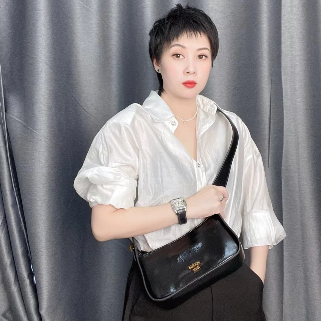 真皮女包2022新款小众设计油蜡皮法棍包简约时尚腋夜斜跨包