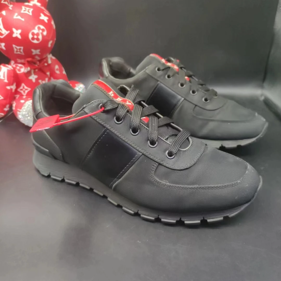 【147折扣】PRADA/普拉达 男款黑武士时尚百搭低帮潮流41.5欧运动鞋