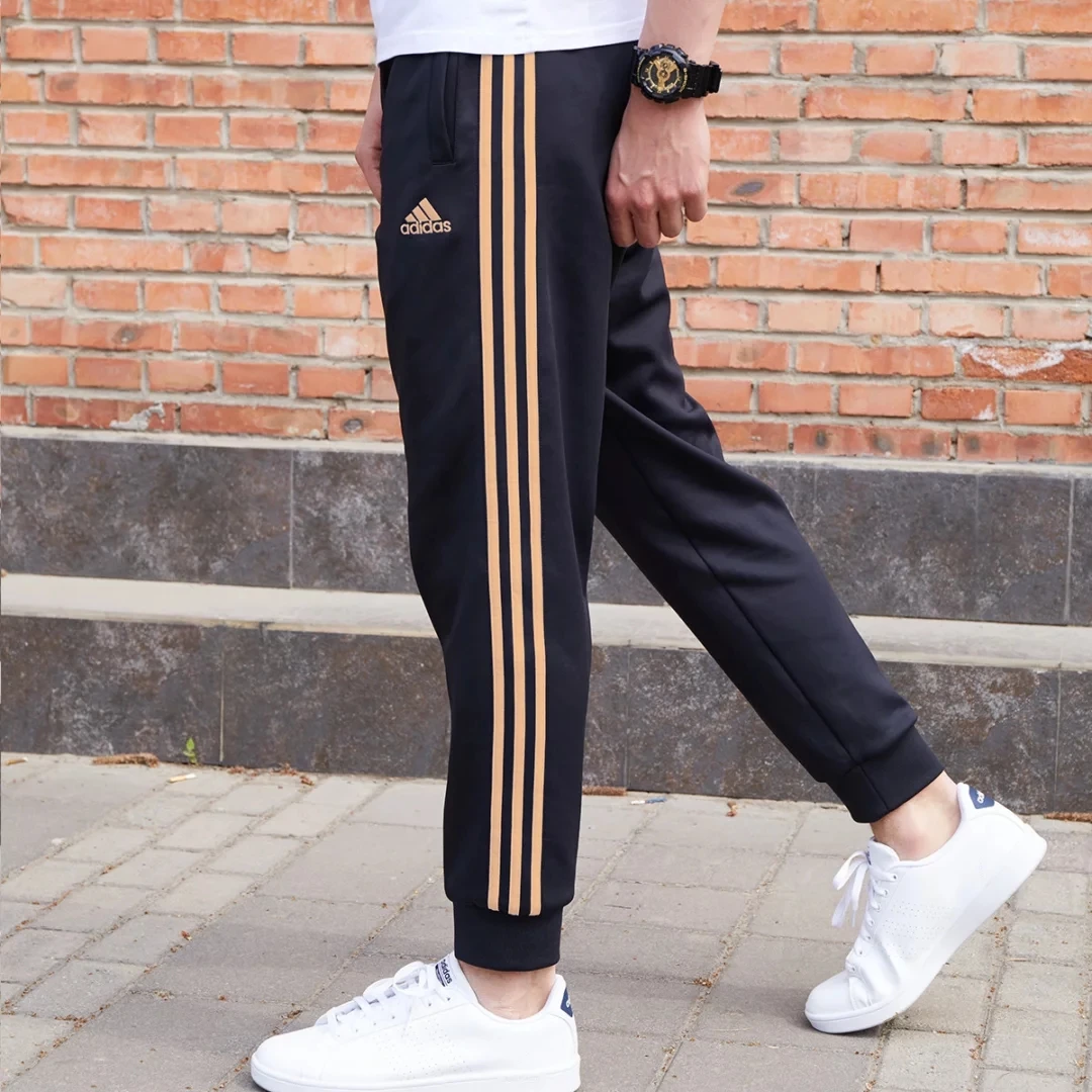 adidas/阿迪达斯春季速干针织毛圈金标休闲运动裤条纹束脚百搭裤