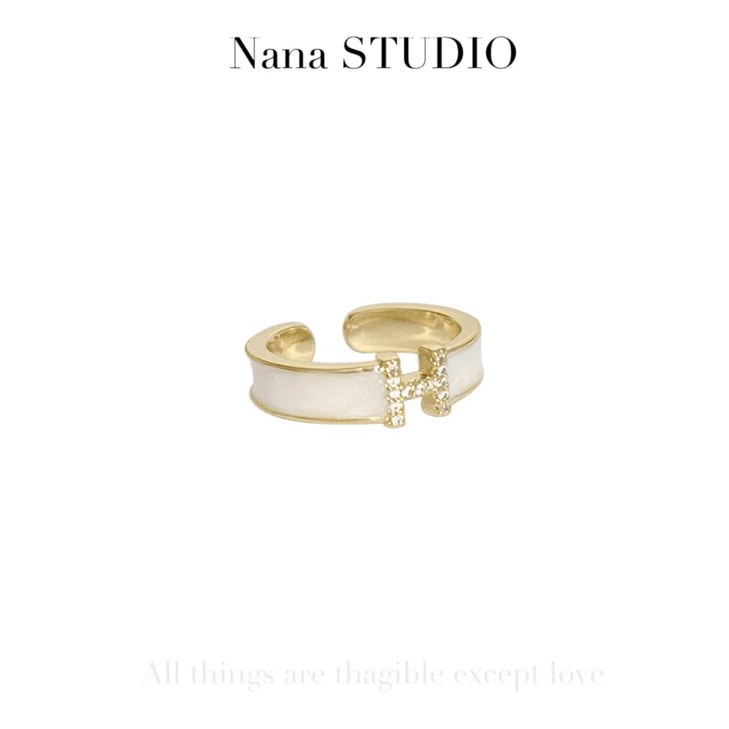 铜合金合成锆石戒指 轻奢简约字母开口戒指D012