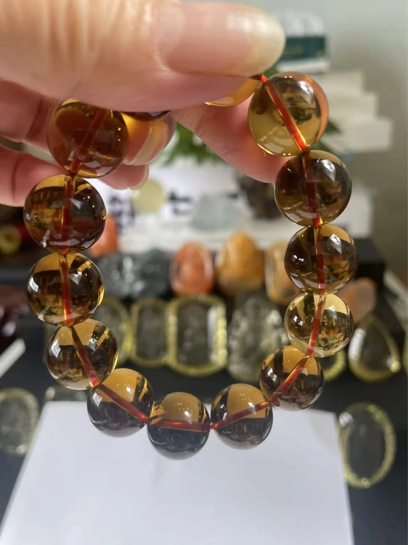 天然水晶黄水晶手串。直径:15mm