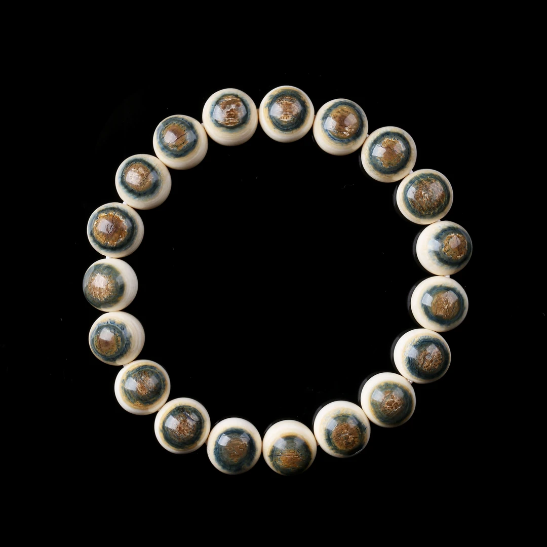 【百晓生】猛犸牙 蓝眼睛 10mm19颗 单圈手串