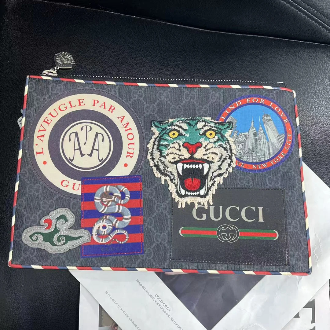 95新 GUCCI/古驰 捐金沉珠/虎头手拿包