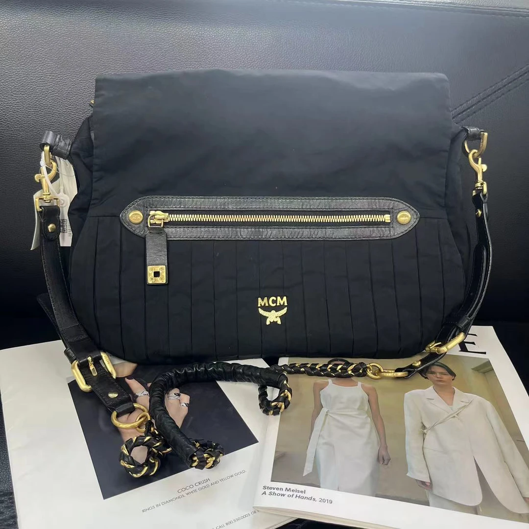 95新 MCM 捐金沉珠/MCM/黑色单肩包