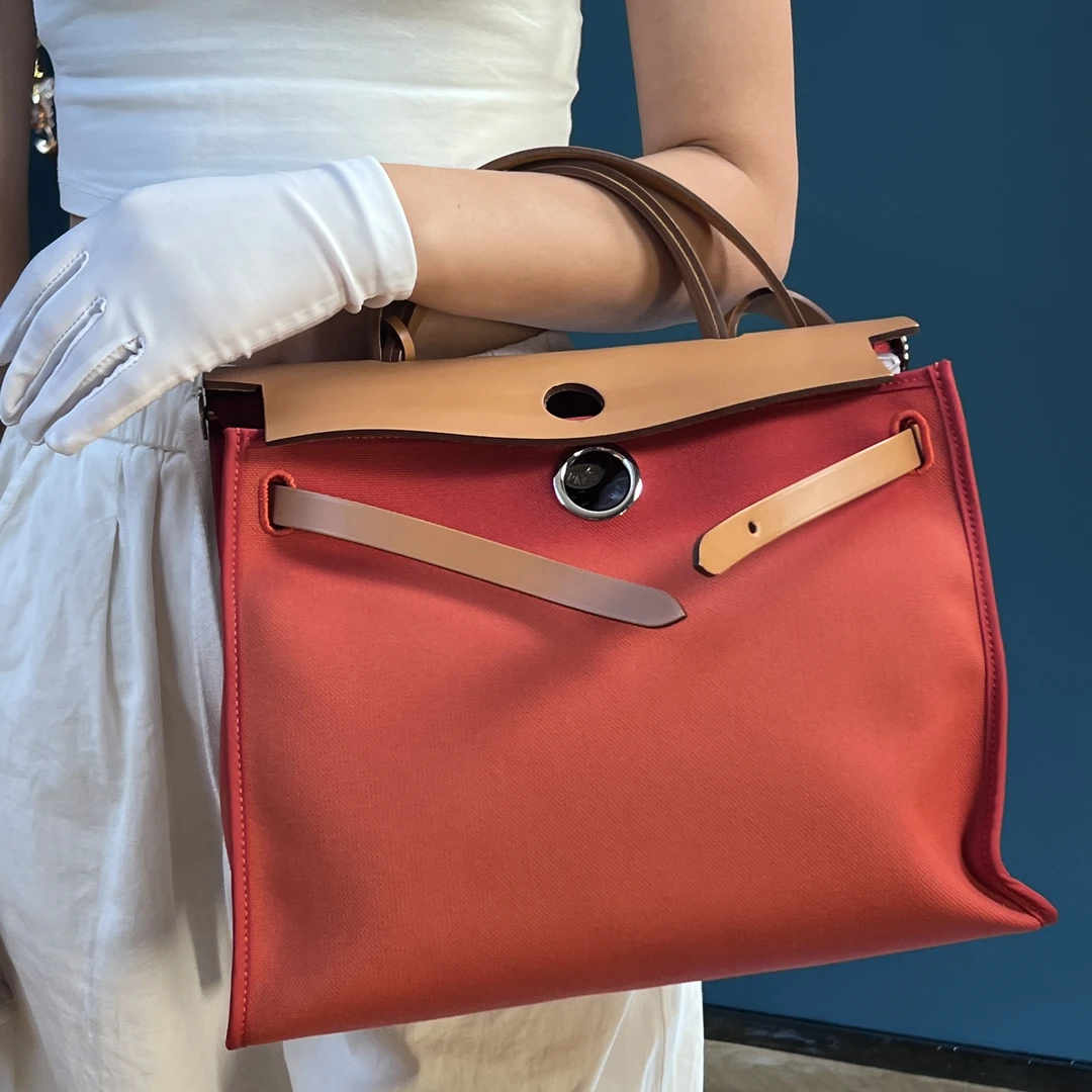 95新 Hermes/爱马仕 Herbag31红帆布银刻/优尔严选/59528