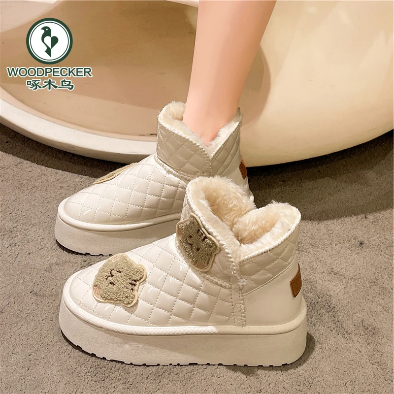 啄木鸟雪地靴女2024年新款冬季卡通学生棉鞋加绒加厚棉靴皮毛一体