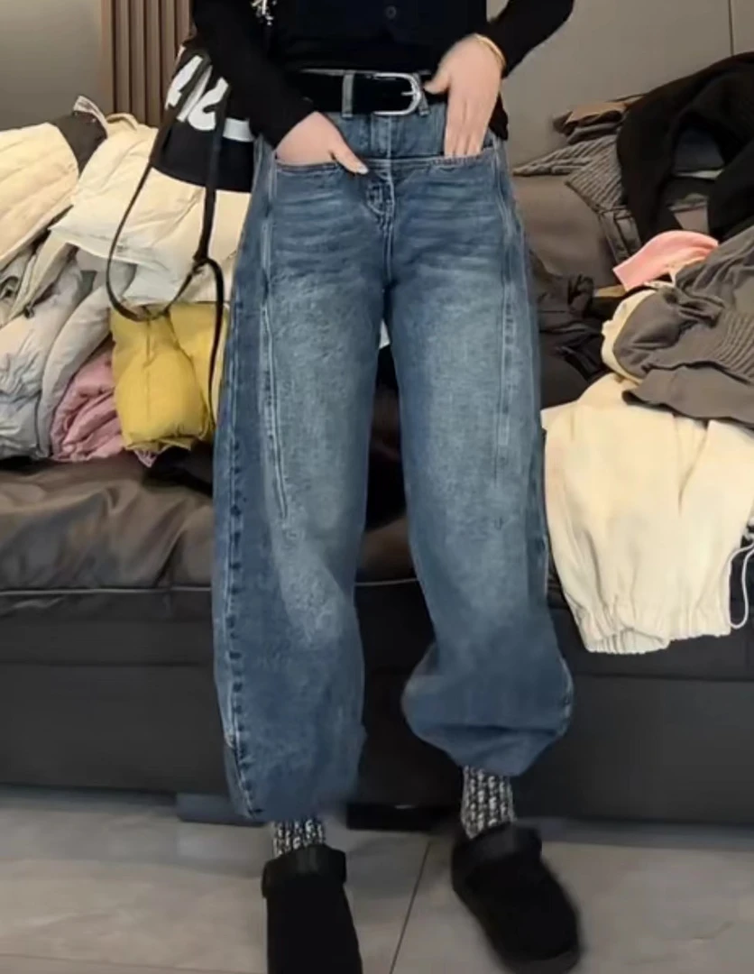 新款压褶显瘦弯刀牛仔裤