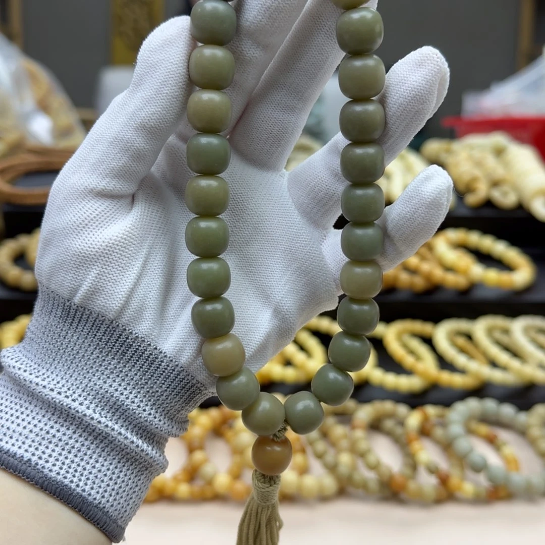 【闪购商品】菩提根/象牙果手串山**水2年。27颗手持。12*13。