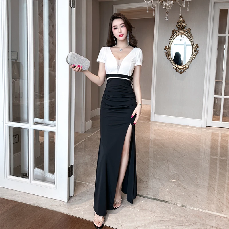 时尚女装2025新款高端感开叉气质黑色轻奢修身包臀主持人礼裙