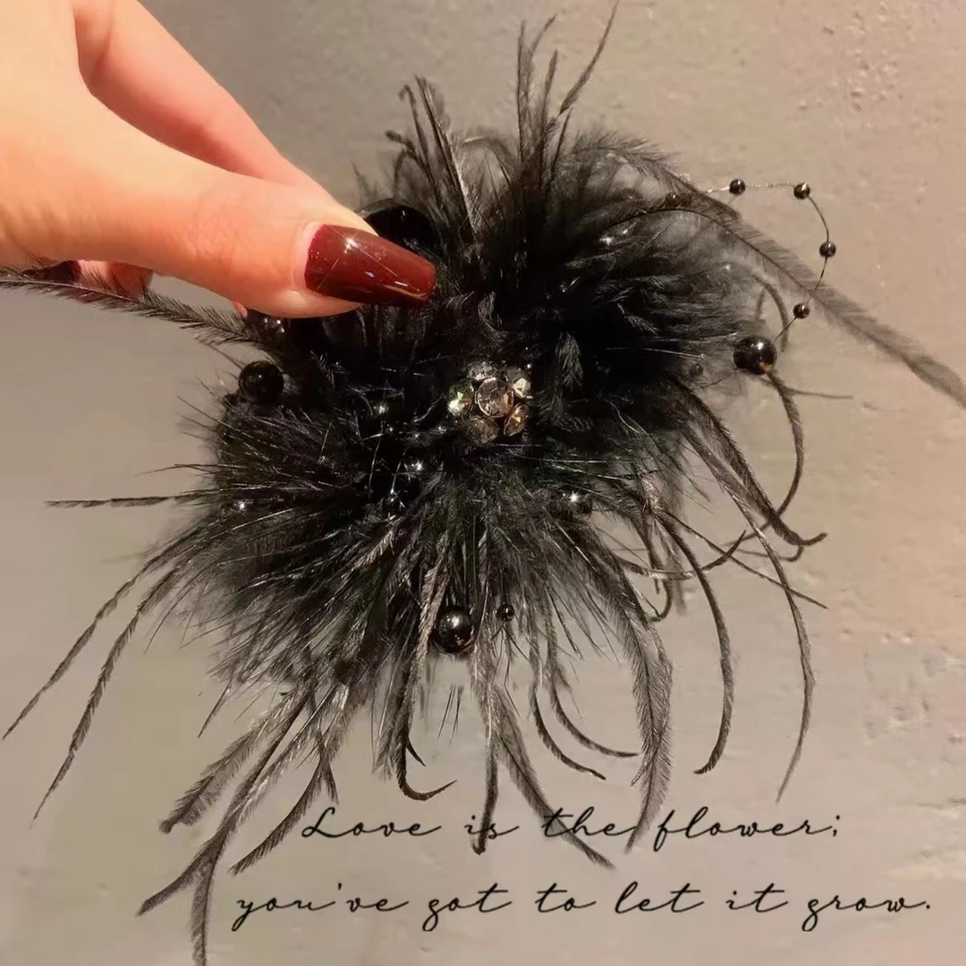 2024新款高级感轻奢法式黑色羽毛浪漫氛围感时尚百搭抓夹鲨鱼夹女