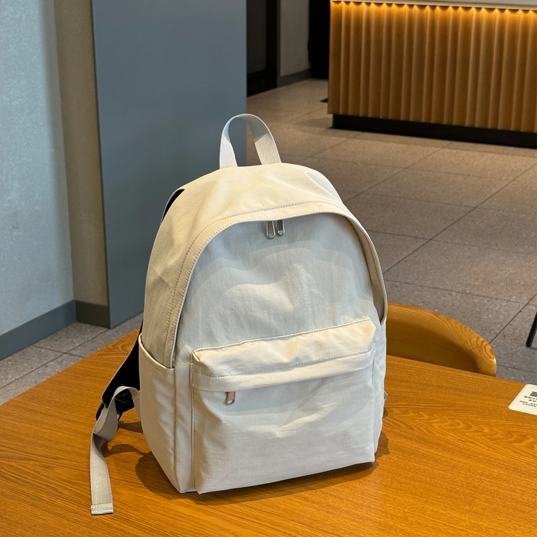 大容量双肩包女初高中大学生书包户外背包百搭超轻便携旅行包包