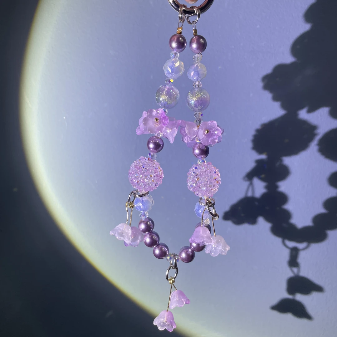 编织粉色系珍珍流苏花簇手机链C298