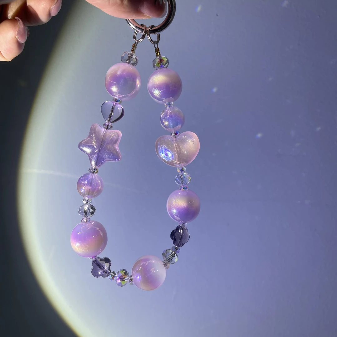 编织粉紫色大颗粒细闪珠款手机链C694