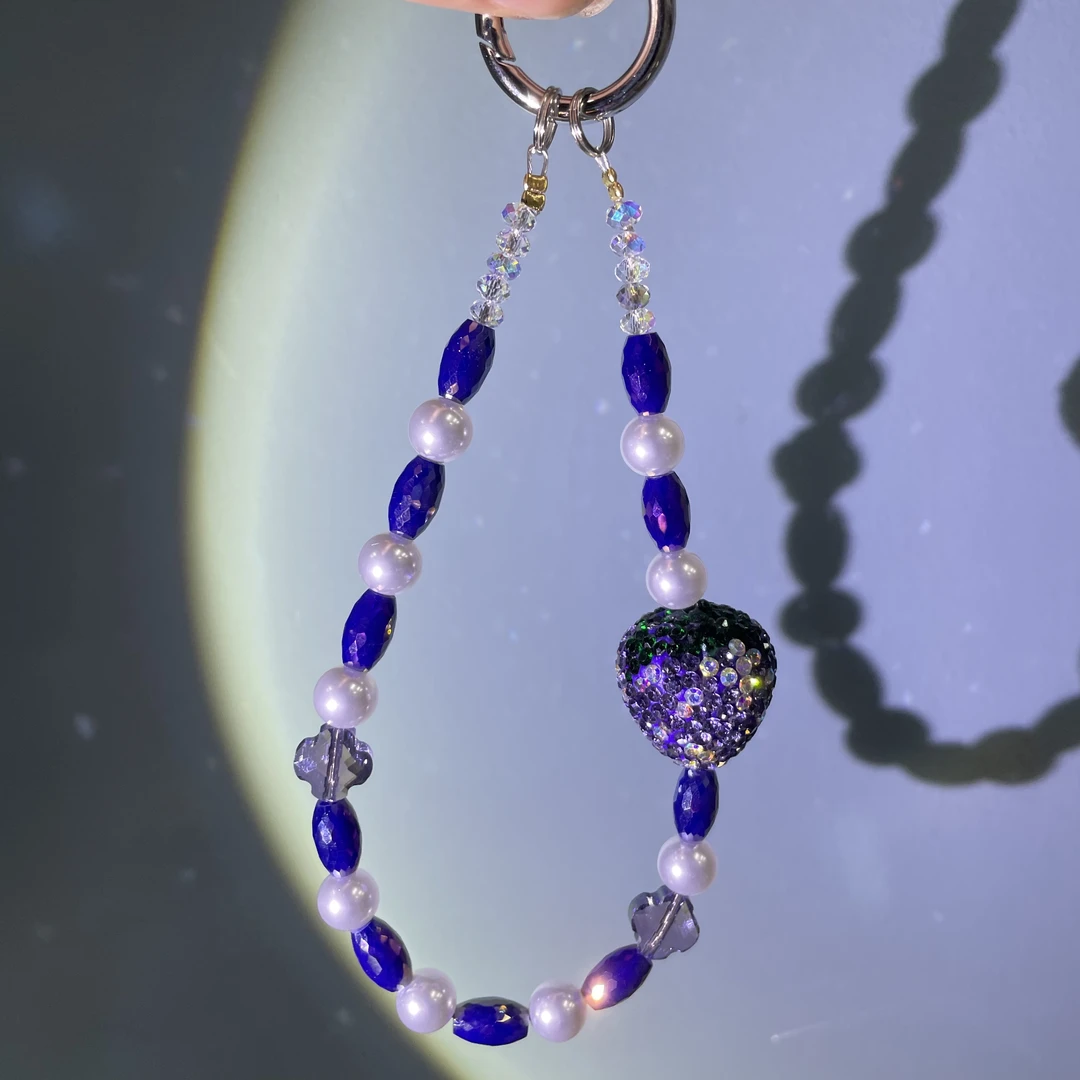 编织深紫色大草莓手机链C500