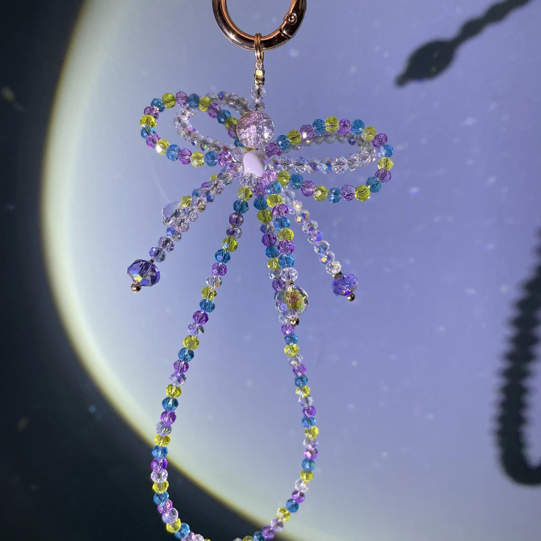 编织小颗粒彩色蝴蝶结手机链C185