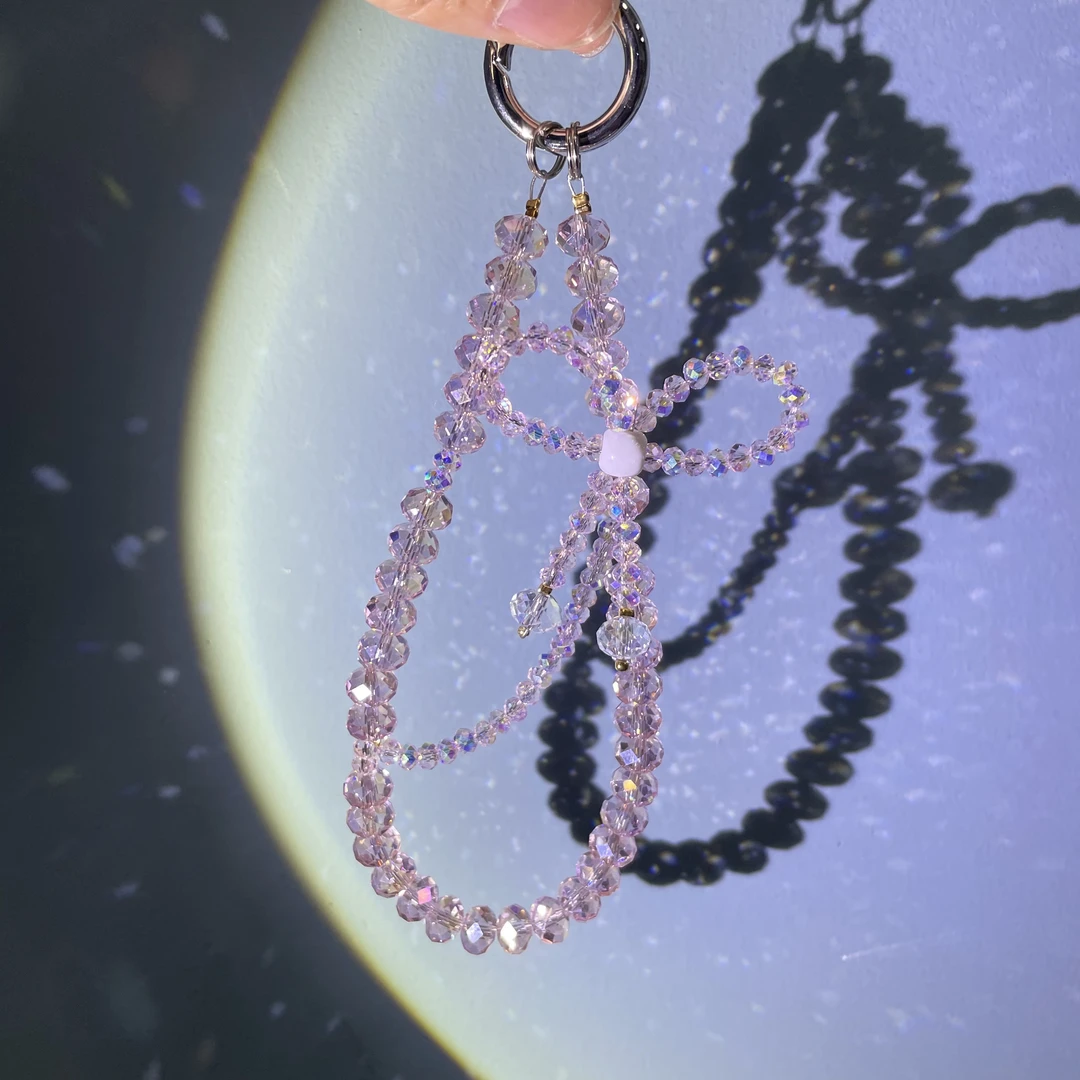 编织原创粉色系编织蝴蝶结手机链C164