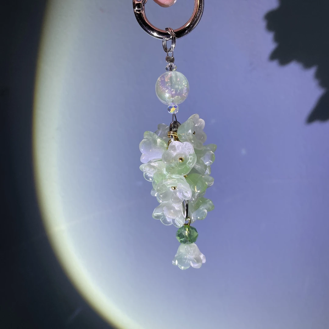 编织铃兰花簇提溜款手机坠C566