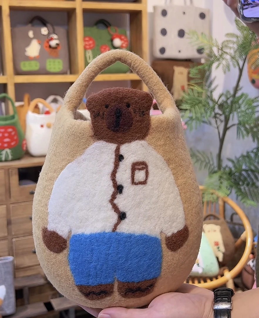 毛毡饼干熊水桶手提包包