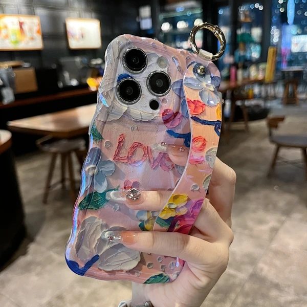 适用苹果系列iPhone16新款手机壳扭扭边小众蓝光腕带love防摔透气