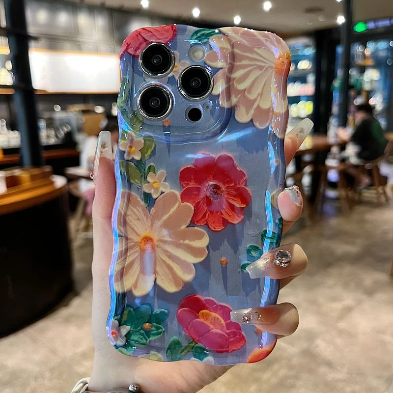 适用苹果系列iPhone15新款手机壳女款蓝光扭扭复古蓝底海棠花防摔