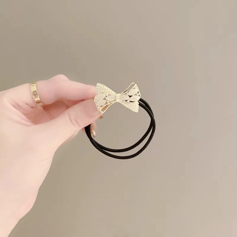 高级感小众猫眼石蝴蝶结头绳女2022年流行夏季扎发绳细金属皮筋