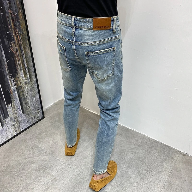 刮烂破洞高街潮牌牛仔裤男款修身小脚2025早秋时尚韩版蓝色九分裤