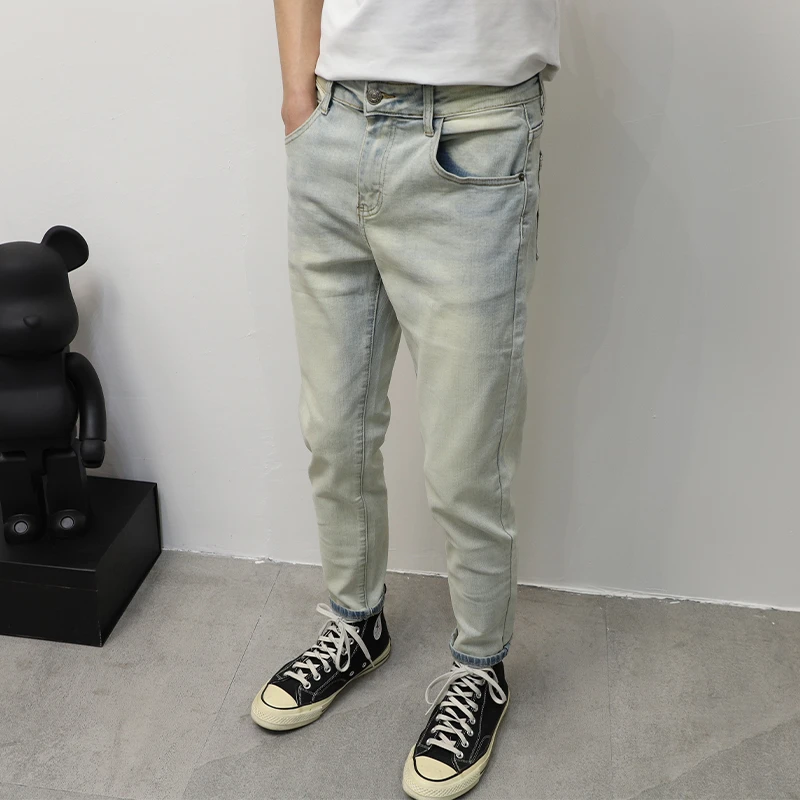 美式休闲潮流牛仔裤男士修身小脚2025秋冬新款泥黄复古百搭九分裤