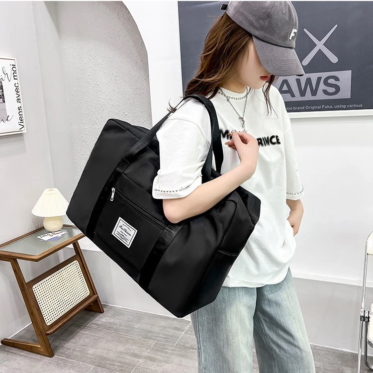 拉杆旅行收纳袋手提短途行李包牛津布大容量衣服被子收纳时尚休闲