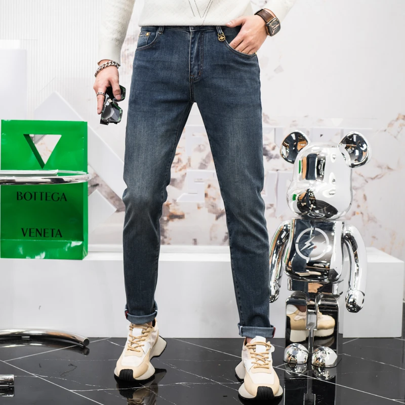 欧货蓝色牛仔裤男士潮牌秋季新款修身小脚裤子男潮流