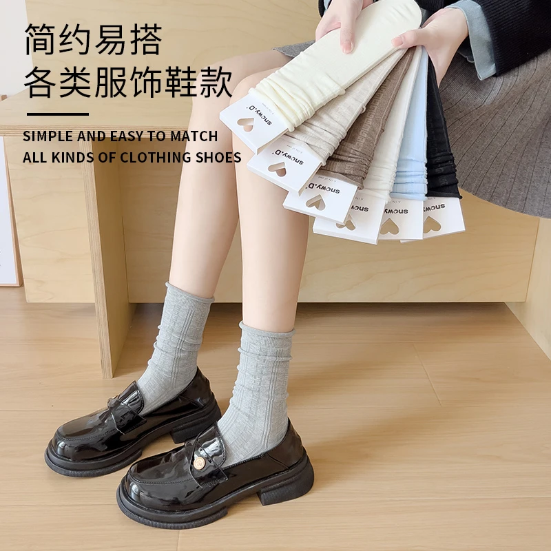 袜子女秋冬季咖色堆堆小腿袜配小皮鞋纯色miu系针织卷边长棉袜