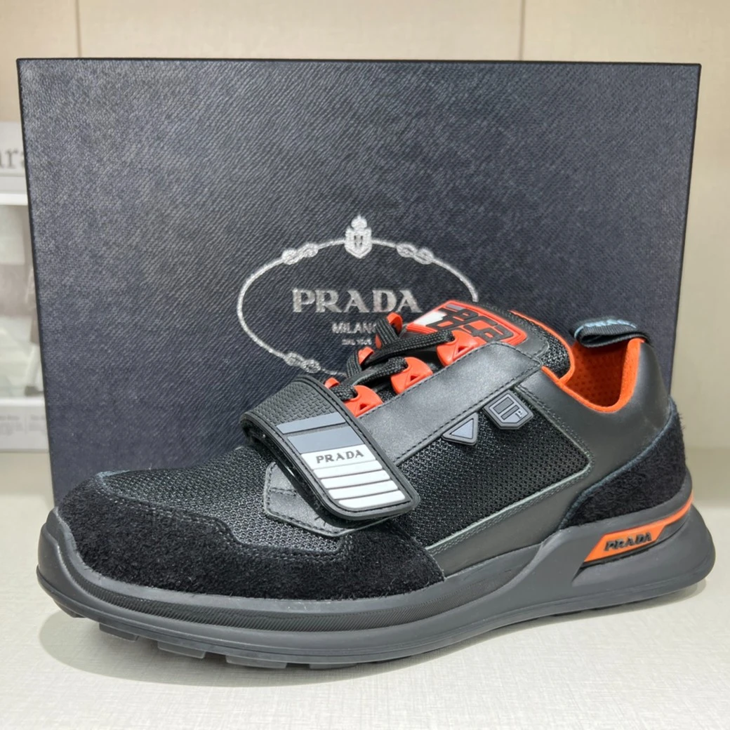 全新未使用 Prada/普拉达 23春夏鞋舌橘色魔术贴运动鞋黑 2EG266