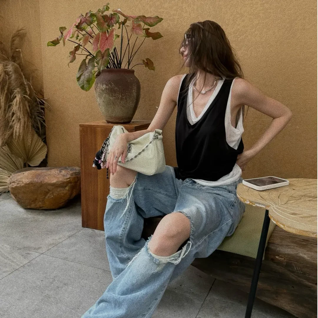 洋气衣服女设计感假两件无袖背心上衣美式辣妹破洞宽松阔腿牛仔裤