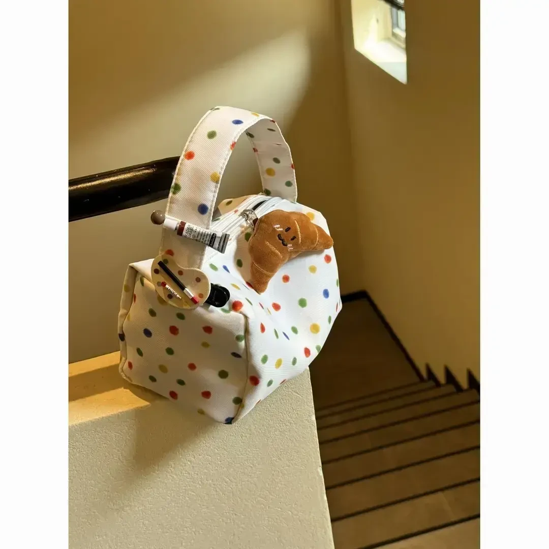 彩色波点小众百搭化妆包高级大容量收纳便携手提洗漱包手提零钱包