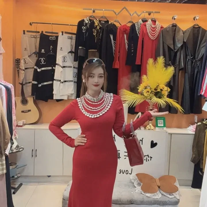 欧美时尚高领烫钻长袖修身绷带黑色连衣裙秋冬款气质显瘦网红针织