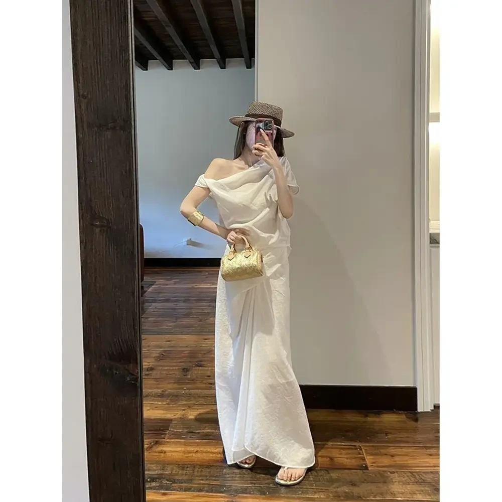 【风铃絮语】不规则设计感辣妹漏肩显瘦上衣显瘦半身裙套装夏季新款