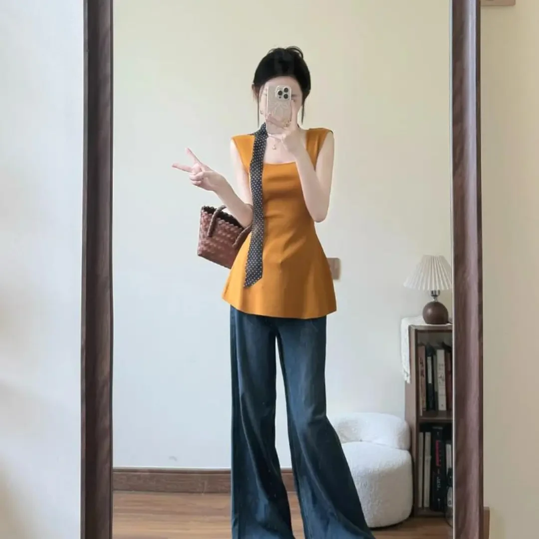 2025夏季新款韩系穿搭设计感小众橘色露背针织衫高腰牛仔裤两件套