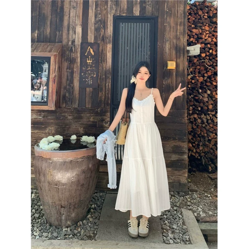 夏季温柔风初恋感白色吊带裙子中长款气质穿搭海边渡假显瘦长裙女