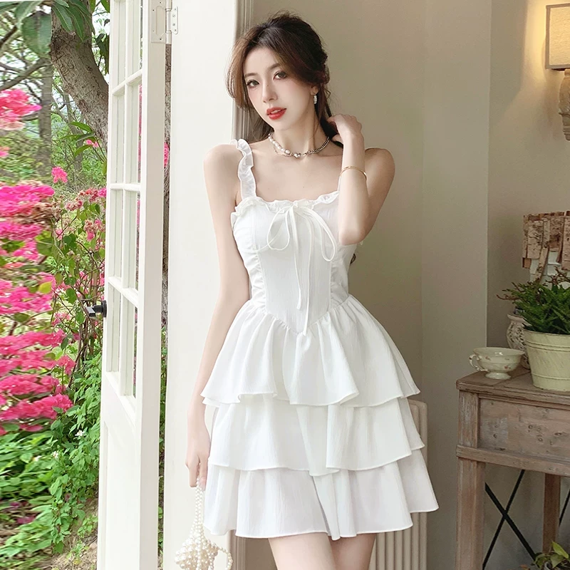 木耳边白色吊带连衣裙女夏2025新款气质收腰显瘦法式蛋糕蓬蓬短裙
