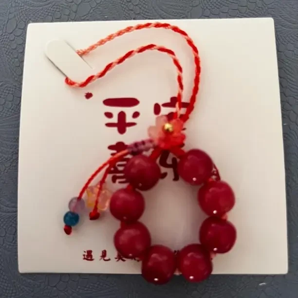 小众迷你设计女款手持手绕指柔跑环手机挂包挂饰品