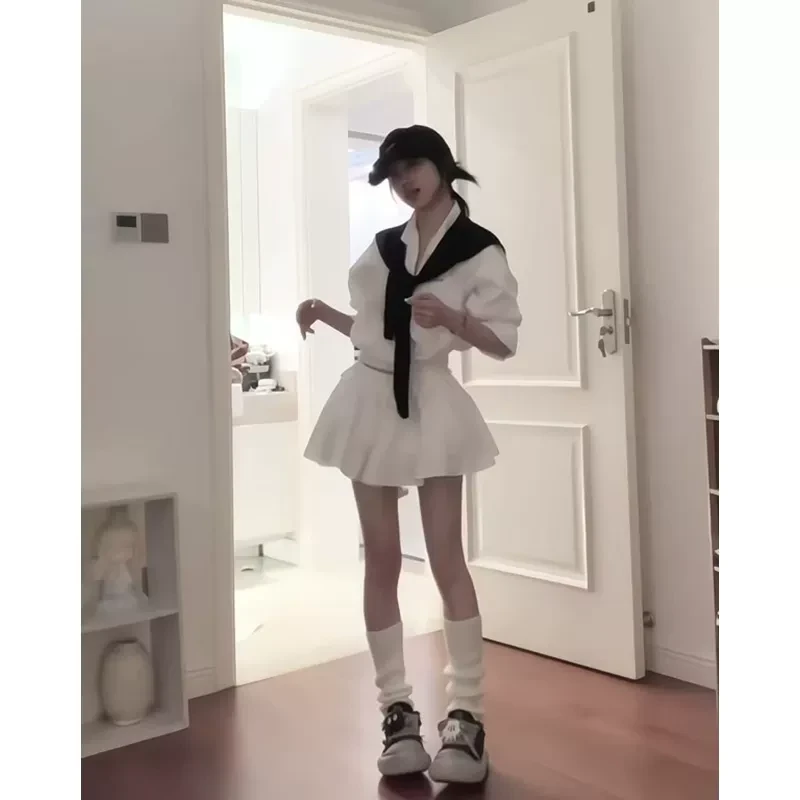 韩系穿搭设计感白色POLO领长袖衬衫女春季新款高腰显瘦半身裙套装