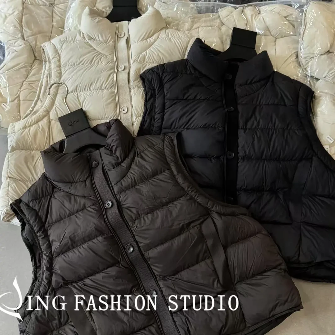 《越穿越喜欢》JING冬季新款时尚宽松白鸭绒马甲女装保暖无袖马夹